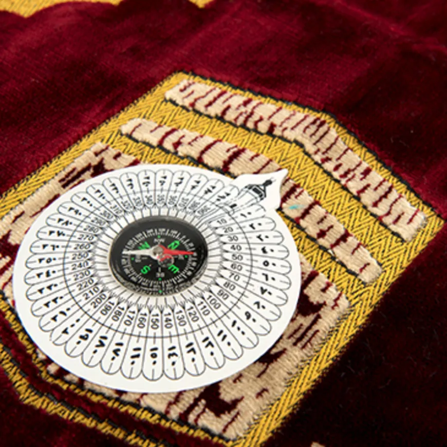 Islamic Prayer Carpet and Compass